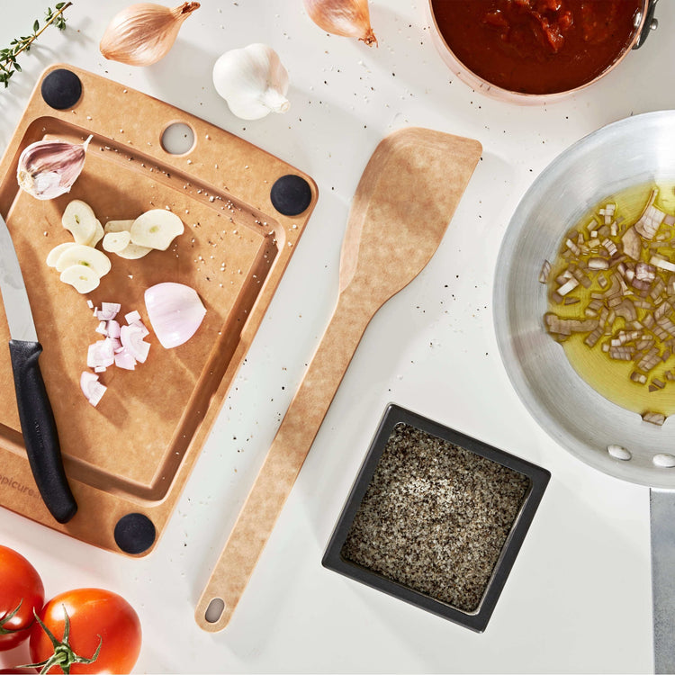 Kitchen Series Sauté Tool in Natural ready to support your cooking needs along with an All-in-One Series cutting board in Natural with a Victorinox Swiss Classic Paring Knife